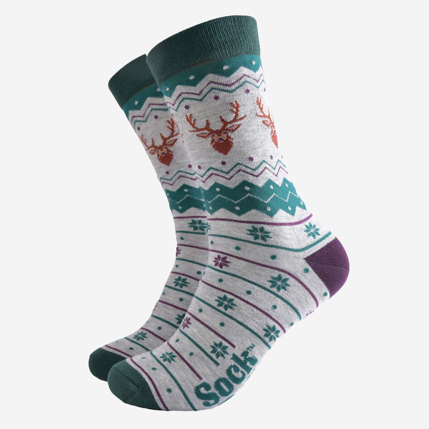 grey and green fair isle style bamboo socks featuring snowflakes and stags