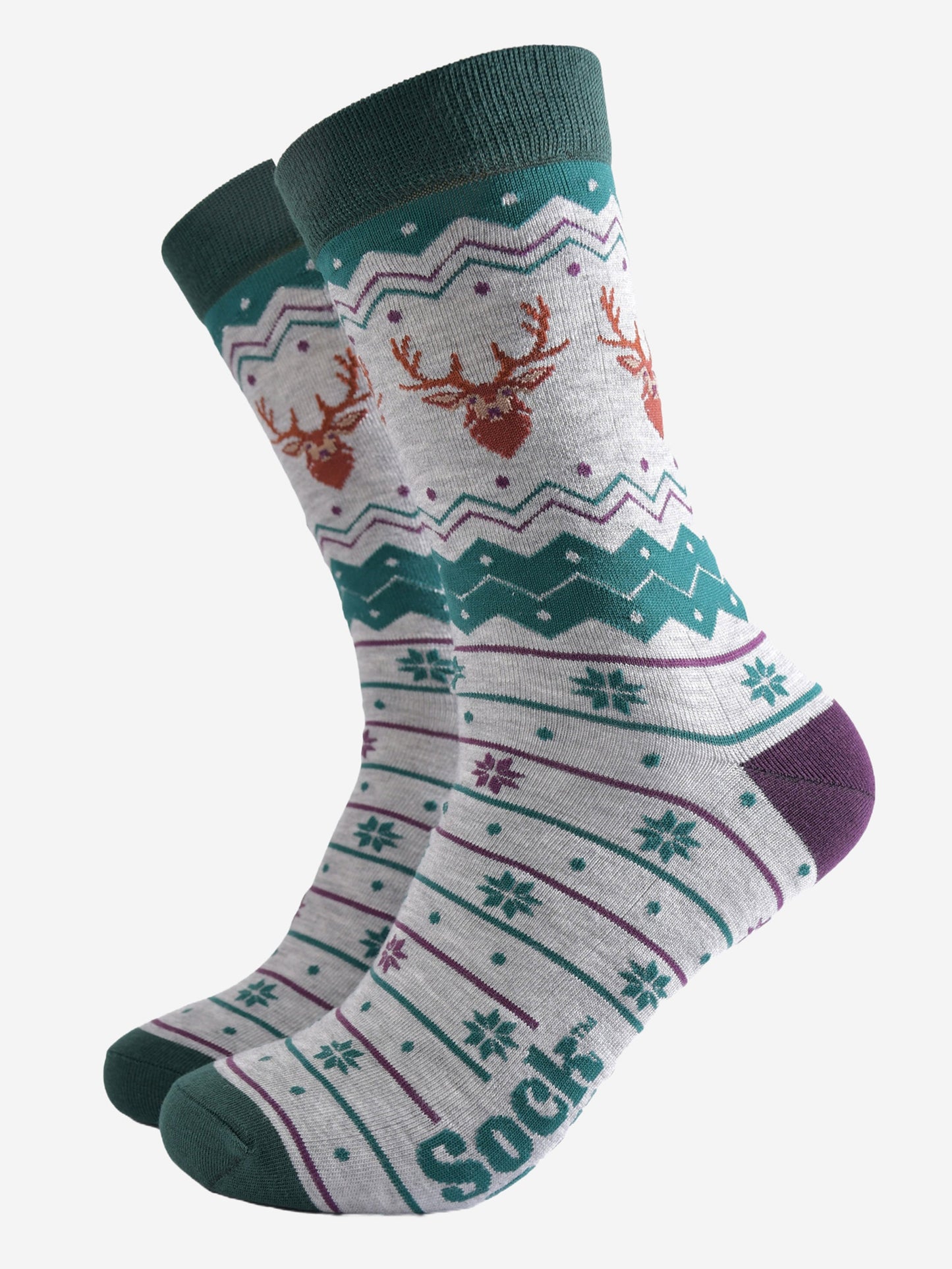 grey and green fair isle style bamboo socks featuring snowflakes and stags