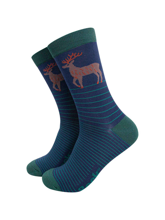 navy blue bamboo crew socks with green stripes and a stag reindeer on the ankle