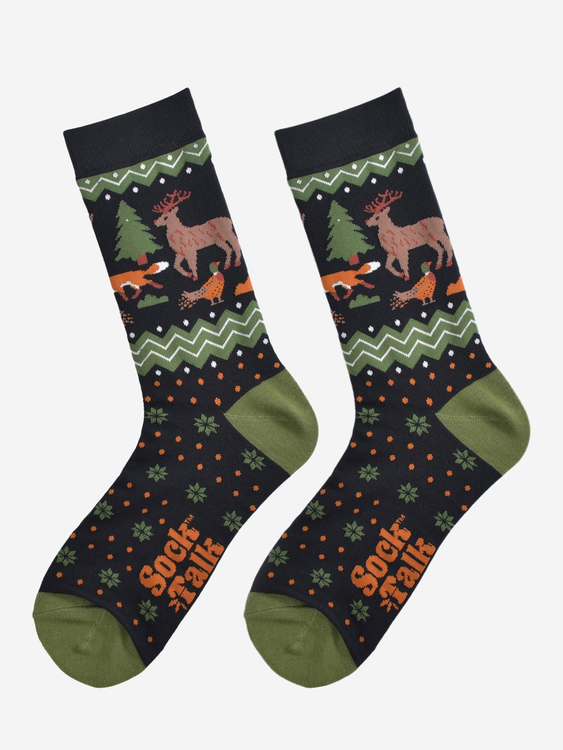 woodland animal bamboo socks laying flat, showing the fair isle pattern and the stag, fox, pheasant and tree pattern on the ankles