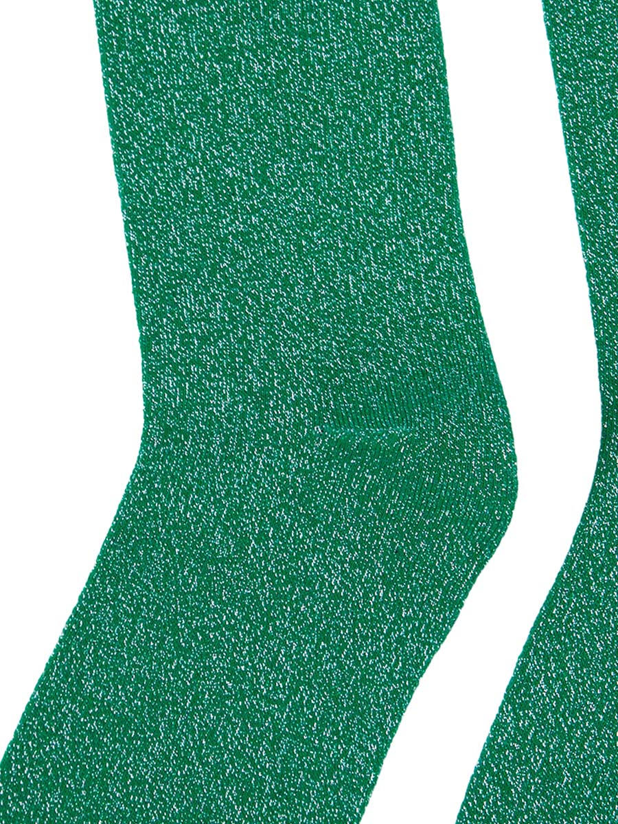 close up of the silver sparkle on these green knee high socks