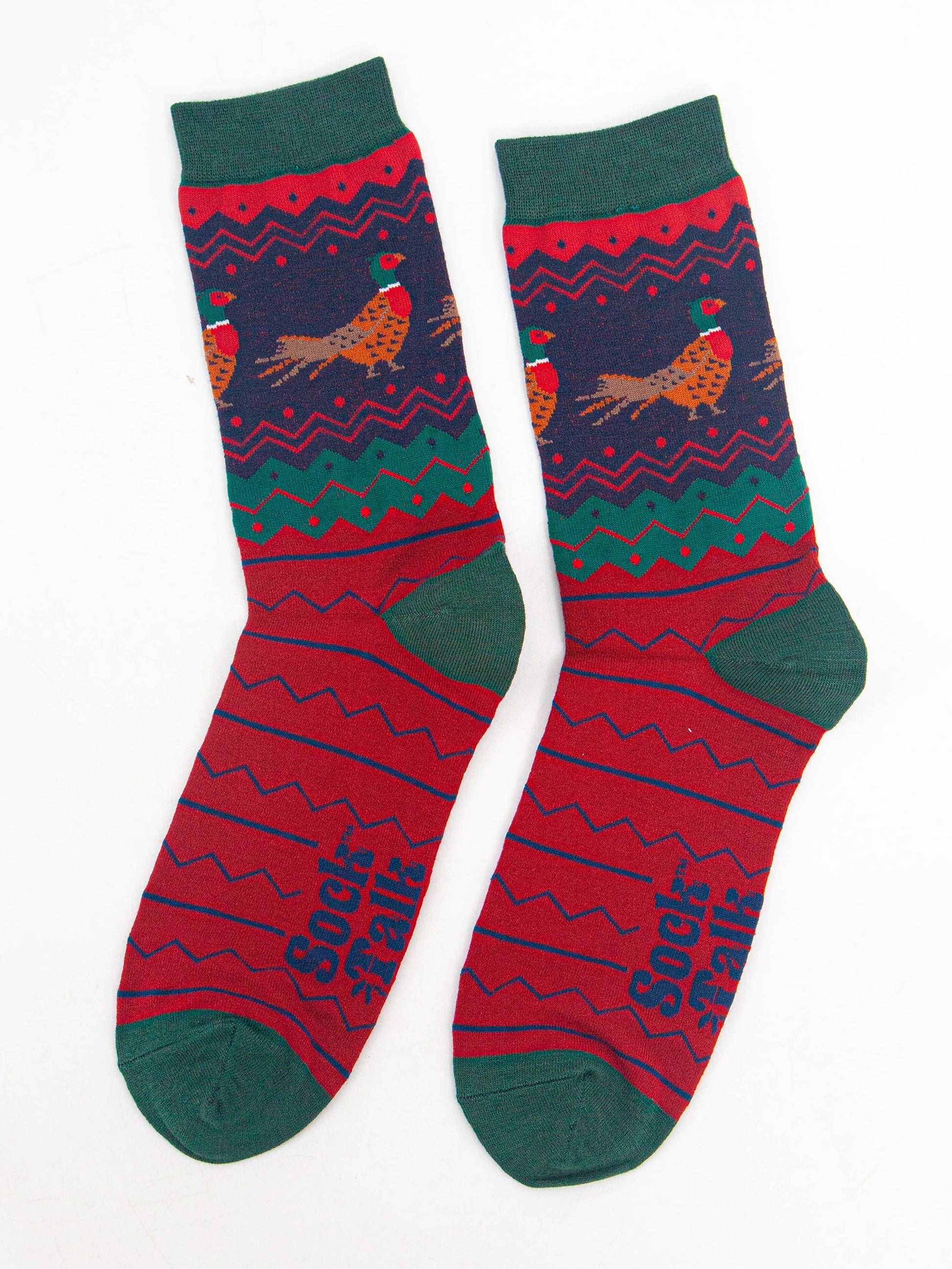 showing the fair isle pheasant socks laying flat, highlighting the all over pattern and the pheasants on the ankles of the socks.