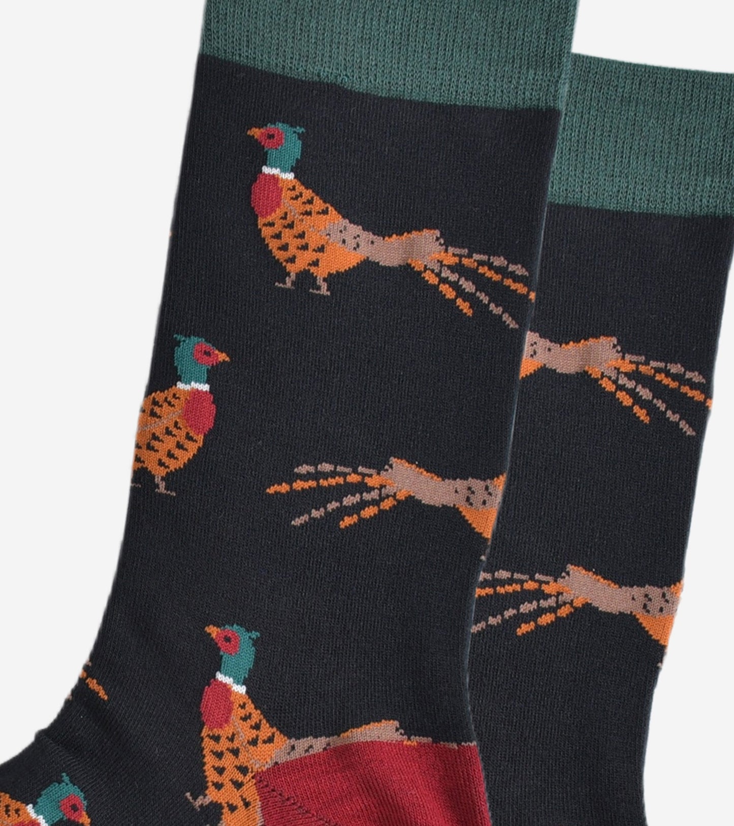 close up of the woodland pheasant pattern on the black bamboo socks, showing the detail of the design