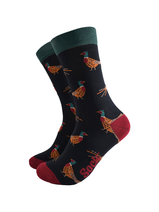 black socks with a pattern of classic woodland pheasants with contrasting red and green heel toe and cuff