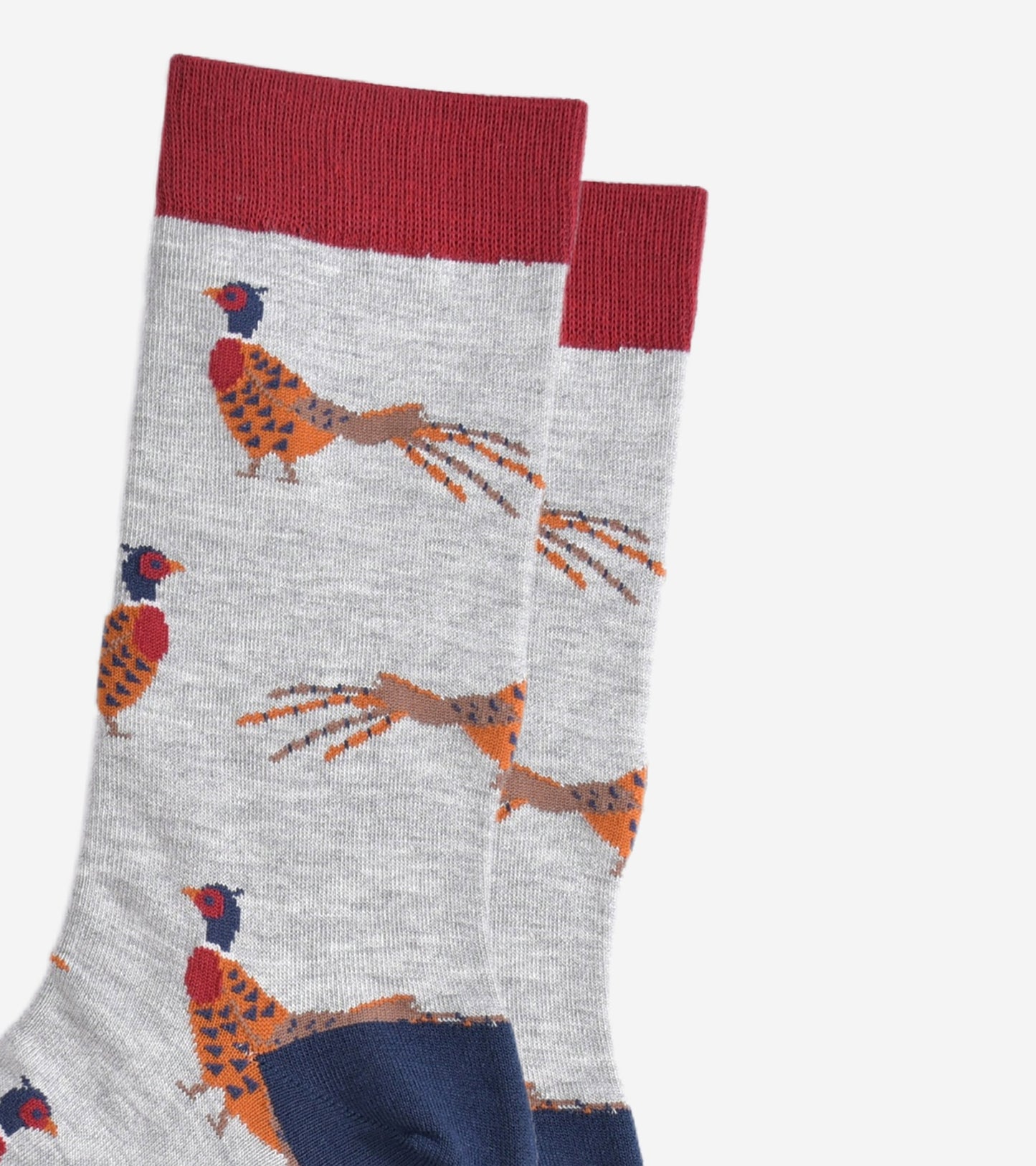 close up of the woodland pheasant pattern on the light grey bamboo socks, showing the detail of the design