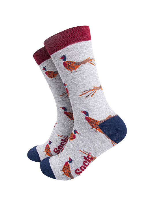 light grey socks with a pattern of classic woodland pheasants with contrasting red and navy blue heel toe and cuff