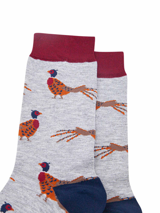 close up of the woodland pheasant pattern on the light grey bamboo socks, showing the detail of the design