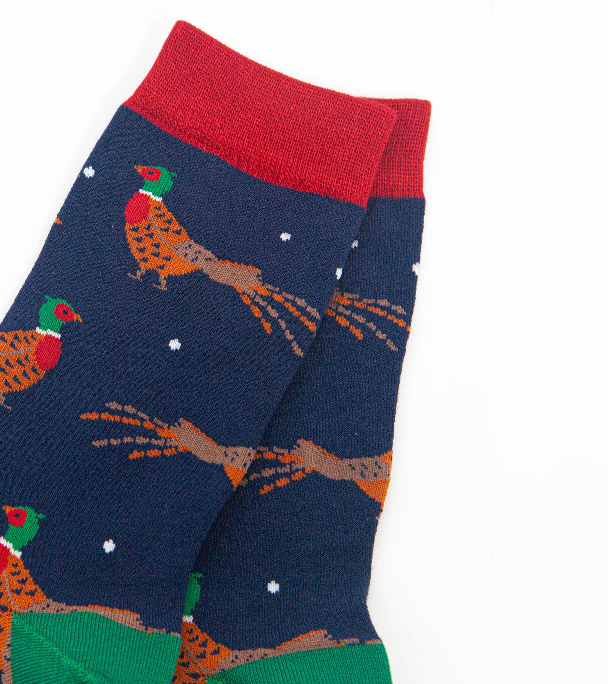 close up of the woodland pheasant design, the pheasants are orange and brown with red bellies and green and red heads. 