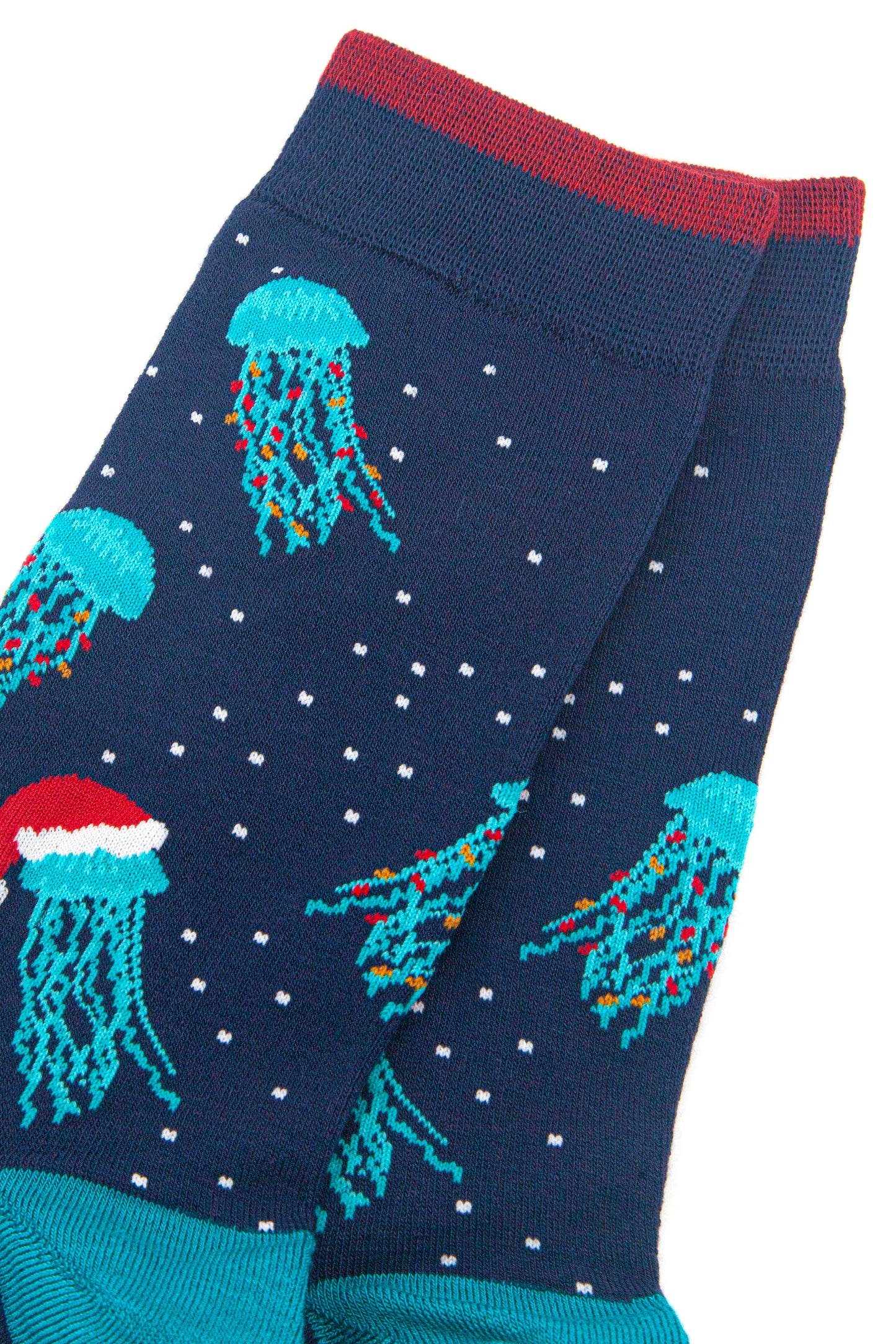 close up of the jellyfish pattern on the sock, they are electric blue with long tentacles, some have colourful party lights entwined in their tentacles, others are wearing red santa hats