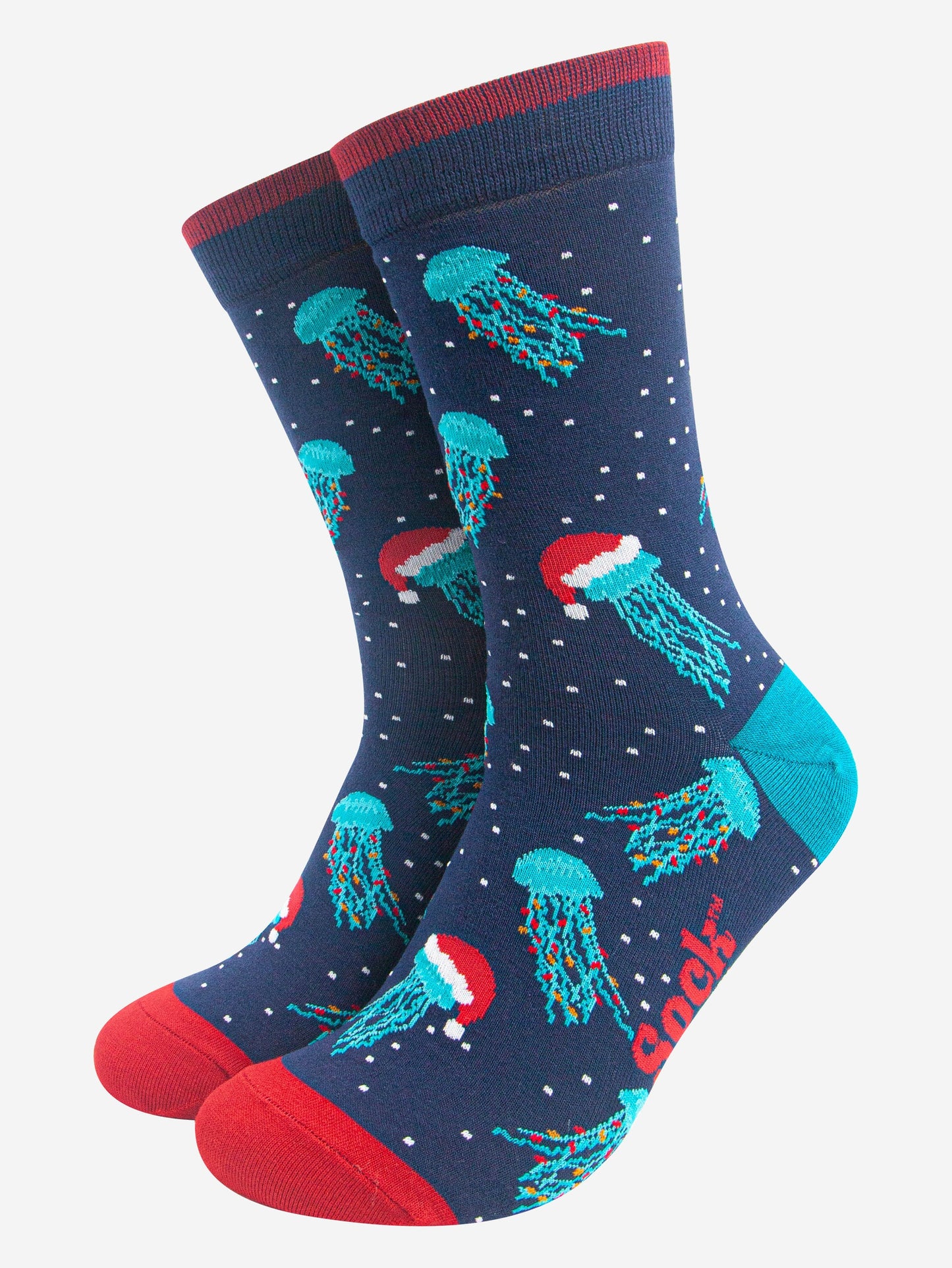 navy blue socks with red toe, cuff and an electric blue heel, there is a pattern of electric blue jellyfish wearing santa hats and party lights all over the socks