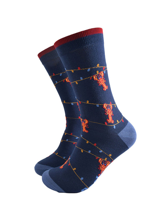 navy blue bamboo socks with a pattern of colourful party lights with red lobsters playfully dangling from them