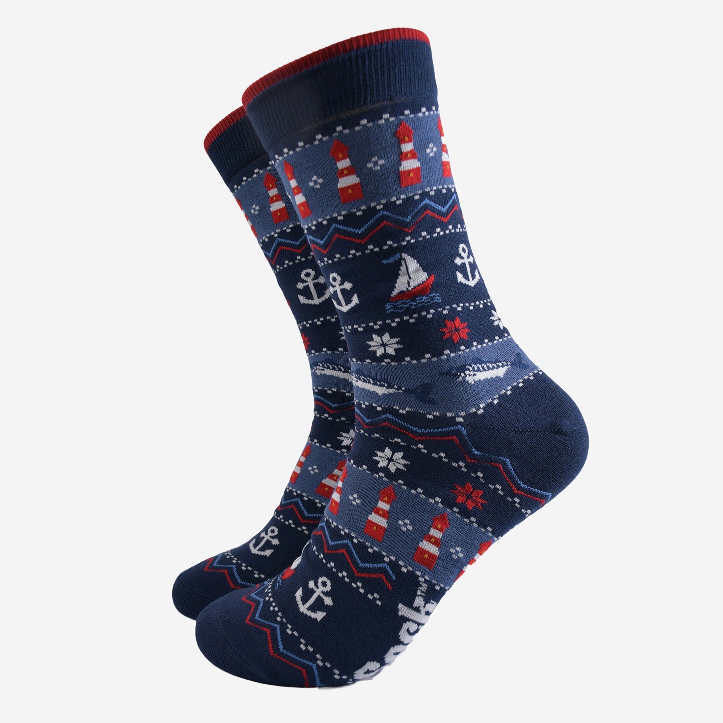 navy blue and red fair isle style bamboo socks featuring sail boats, lighthouses, anchors and snowflakes