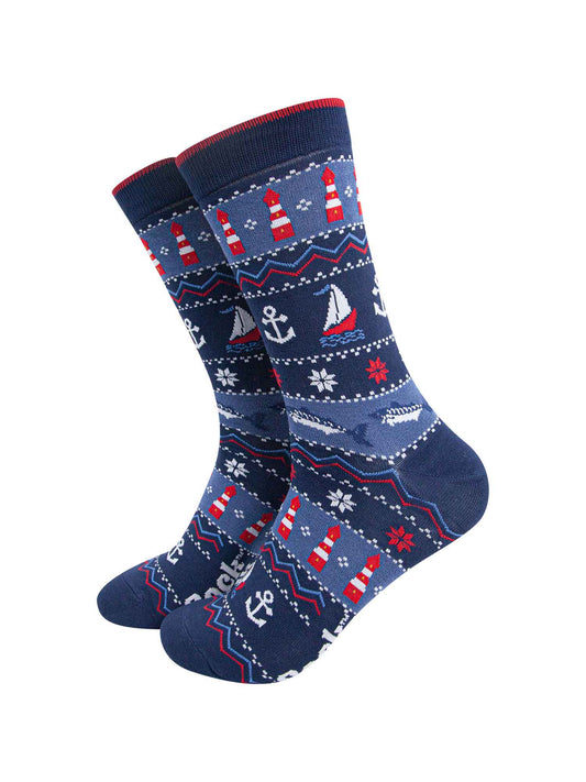 navy blue and red fair isle style bamboo socks featuring sail boats, lighthouses, anchors and snowflakes