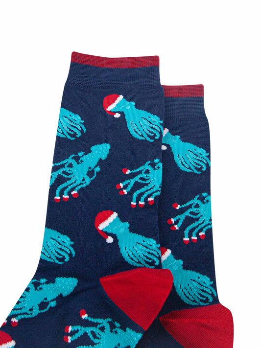 close up of the squid and octopus pattern, the octopus are wearing santa hats, the squid are wearing santa slippers on the ends of their tentacles