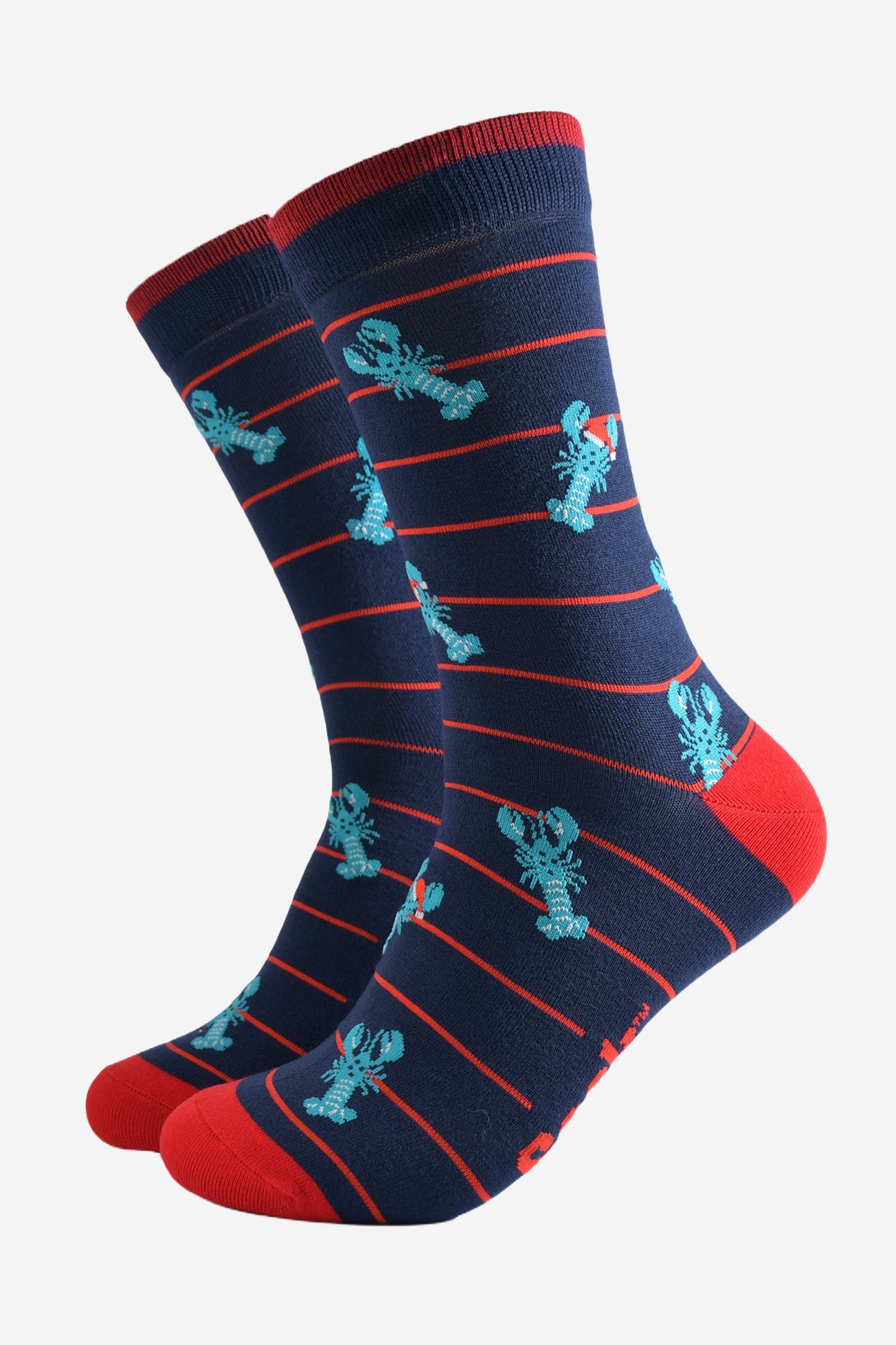 navy blue socks with a red horizontal pin stripe with a pattern of blue lobsters wearing santa hats