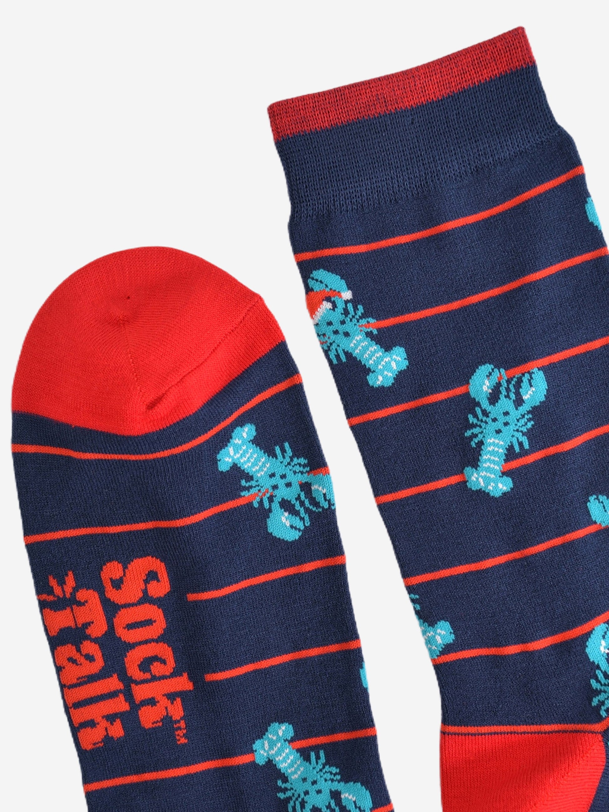 showing the cuff and the toe of the socks, the toe is red and the cuff has a red stripe