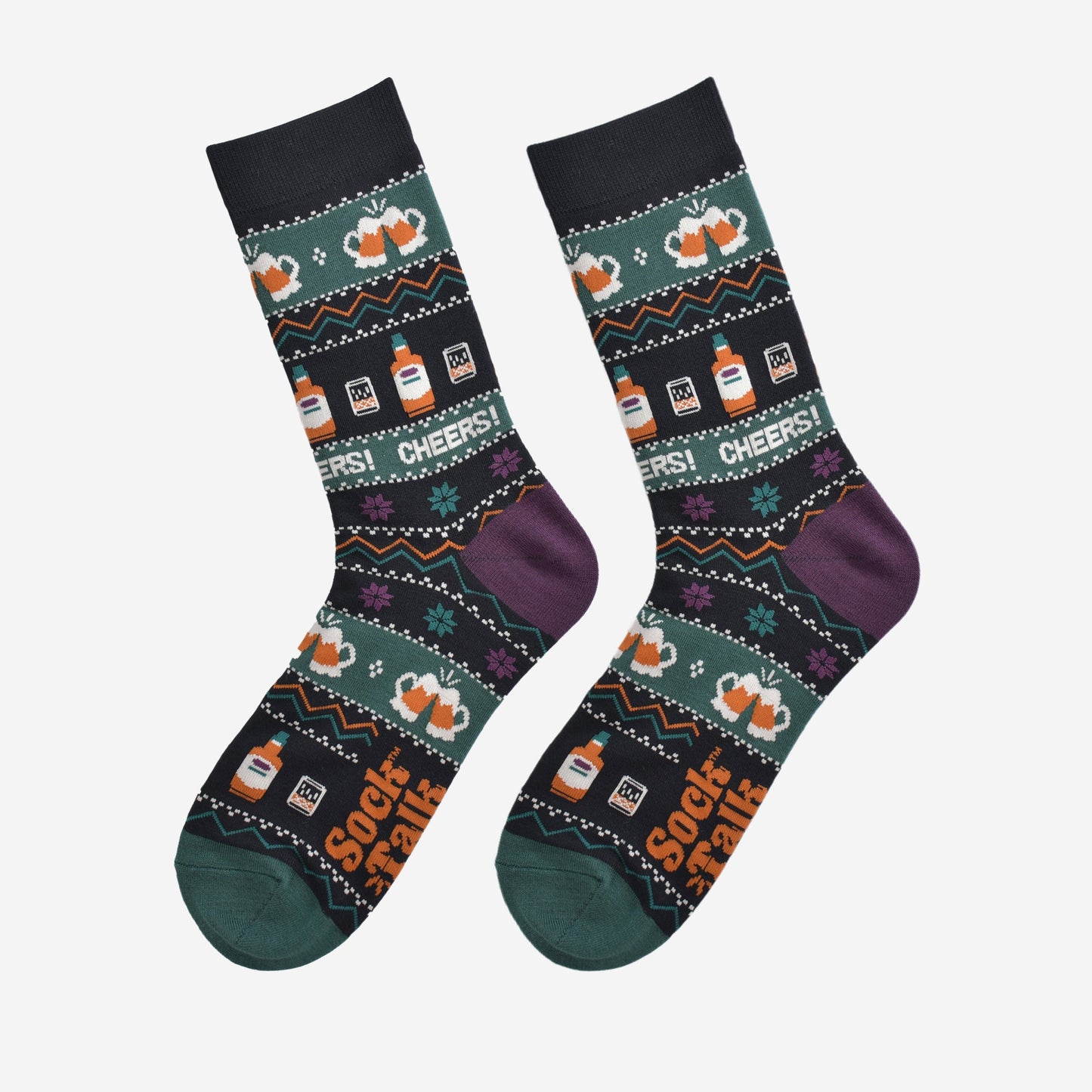 fair isle party drinks socks laying flat, showing the detailed pattern which has whisky glasses, beer mugs and the word cheers running through the design