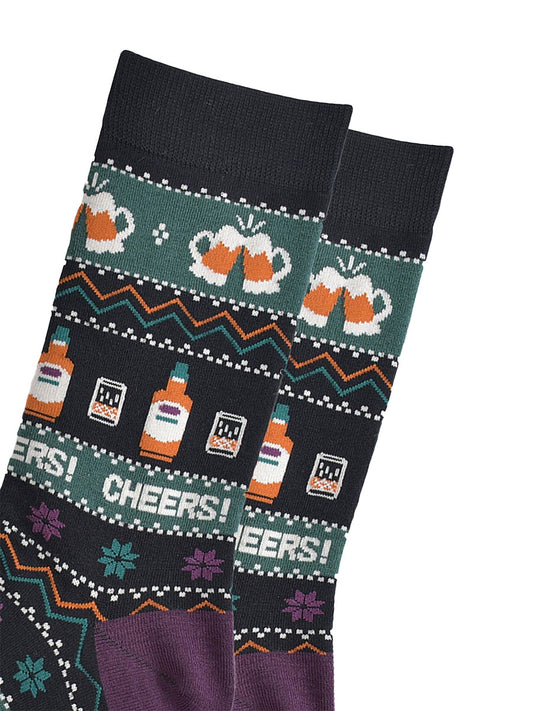close up of the socks, showing clearly the beer glasses, whisky bottles and the fair isle pattern