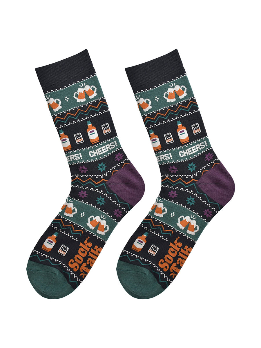 fair isle party drinks socks laying flat, showing the detailed pattern which has whisky glasses, beer mugs and the word cheers running through the design