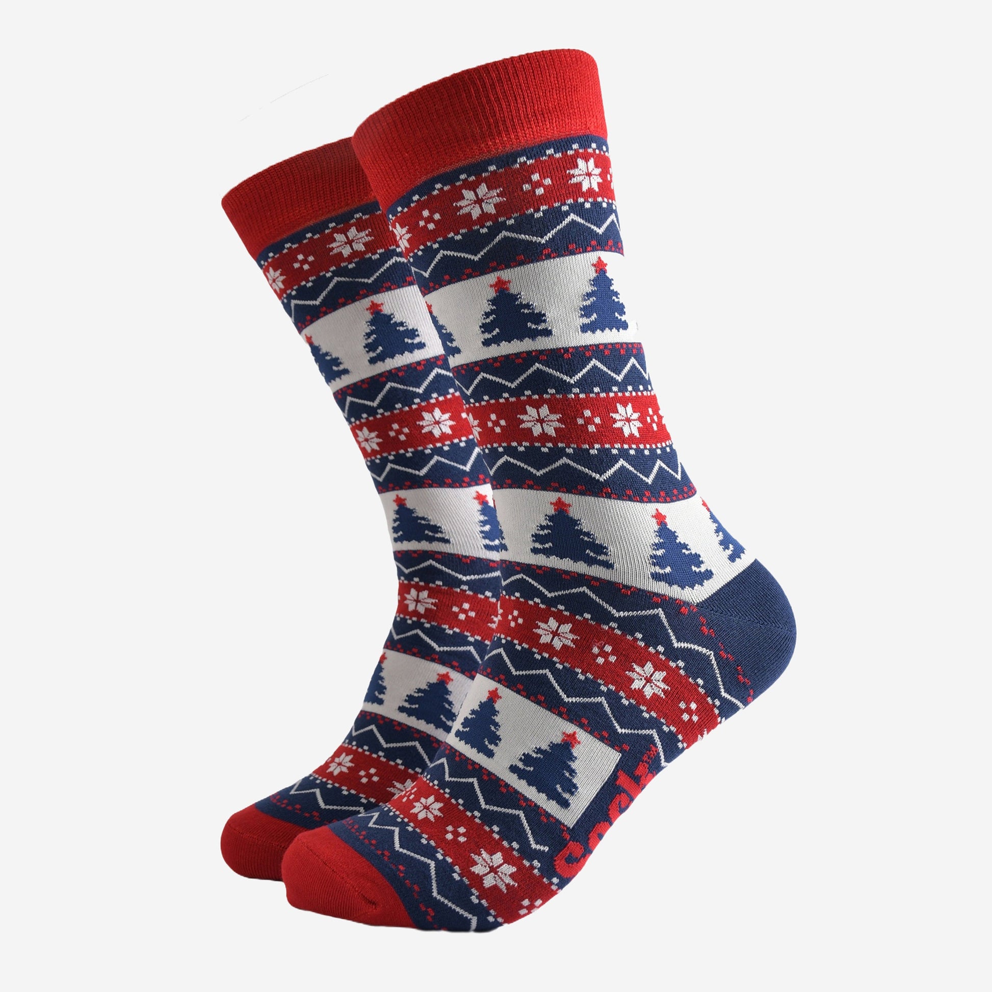 red, blue and white fair isle pattern crew socks featuring xmas trees and snowflakes in the design