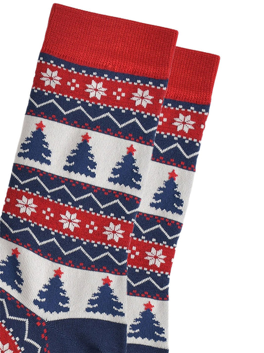 close up of the christmas tree fair isle pattern, showing in detail the intricate design in red, white and navy blue
