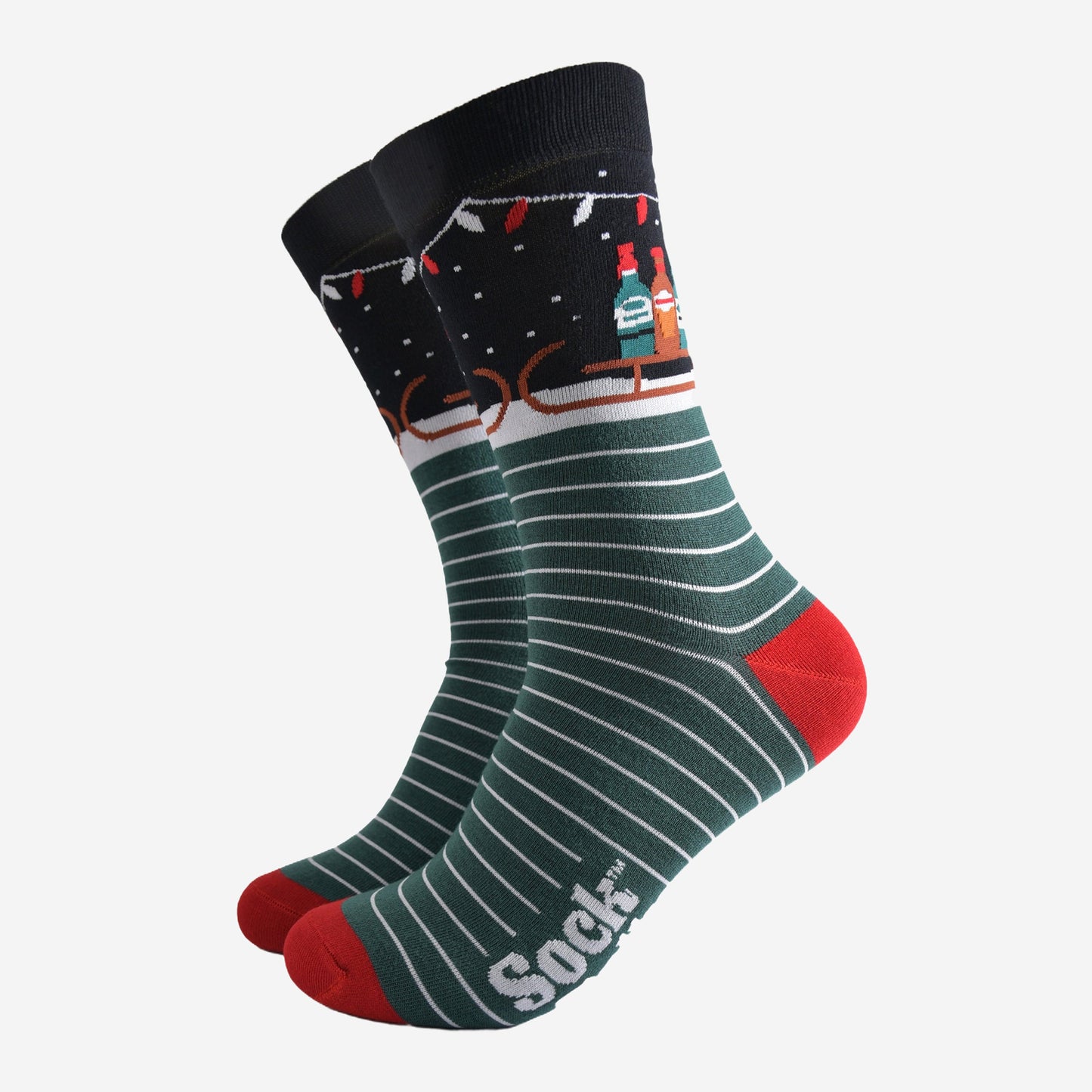 striped green, black and red bamboo socks showcasing a sledge laden with drinks in bottles