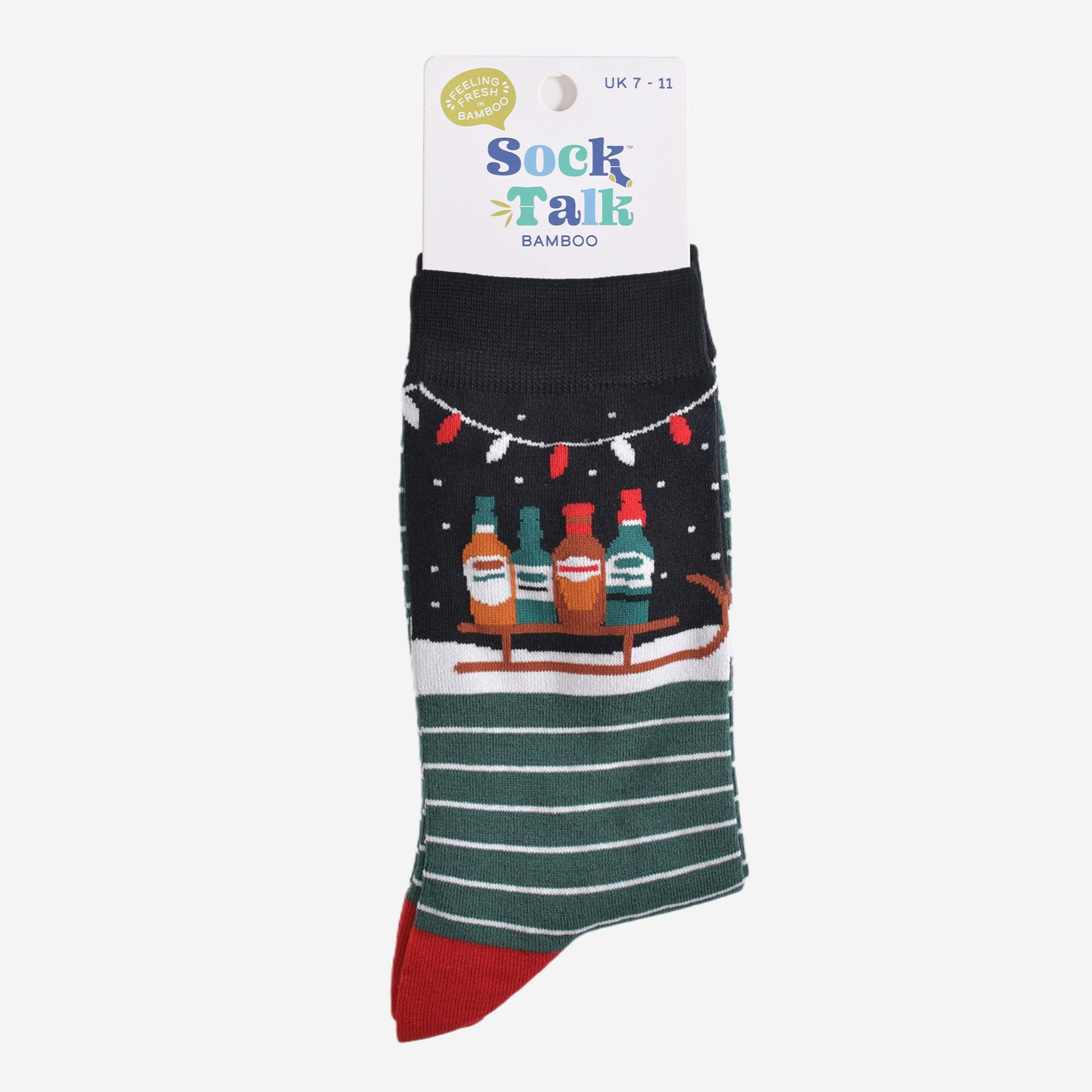 party drinks sledge christmas socks in their sock talk packaging, the socks are a uk size 7-11