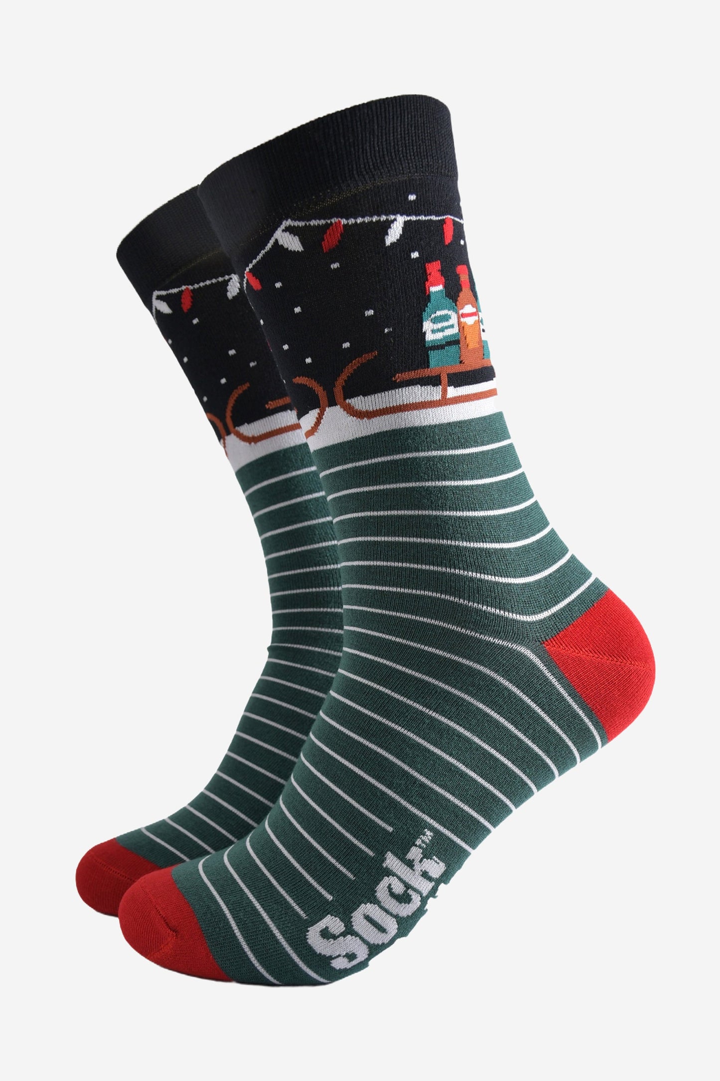 striped green, black and red bamboo socks showcasing a sledge laden with drinks in bottles