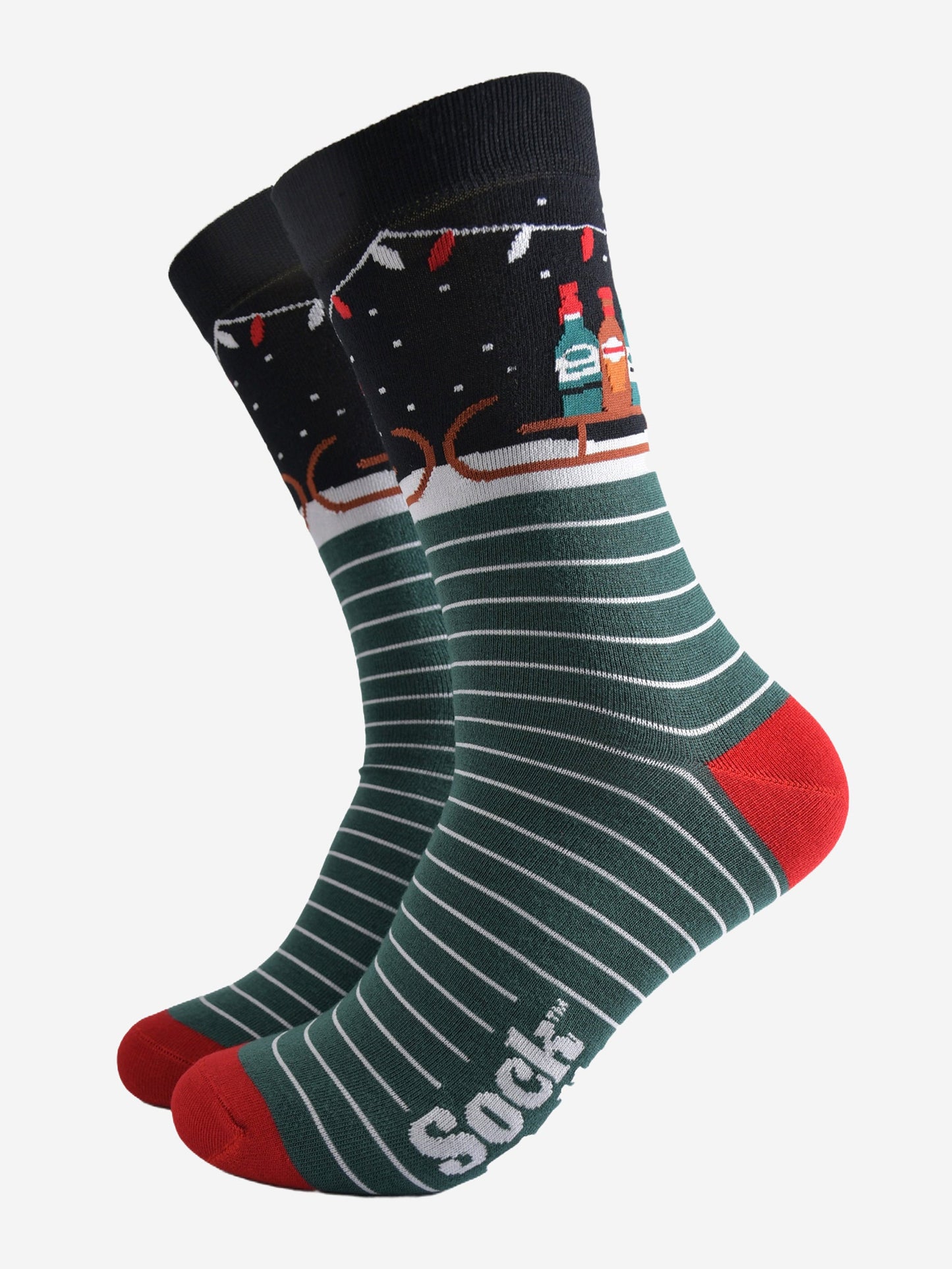 striped green, black and red bamboo socks showcasing a sledge laden with drinks in bottles