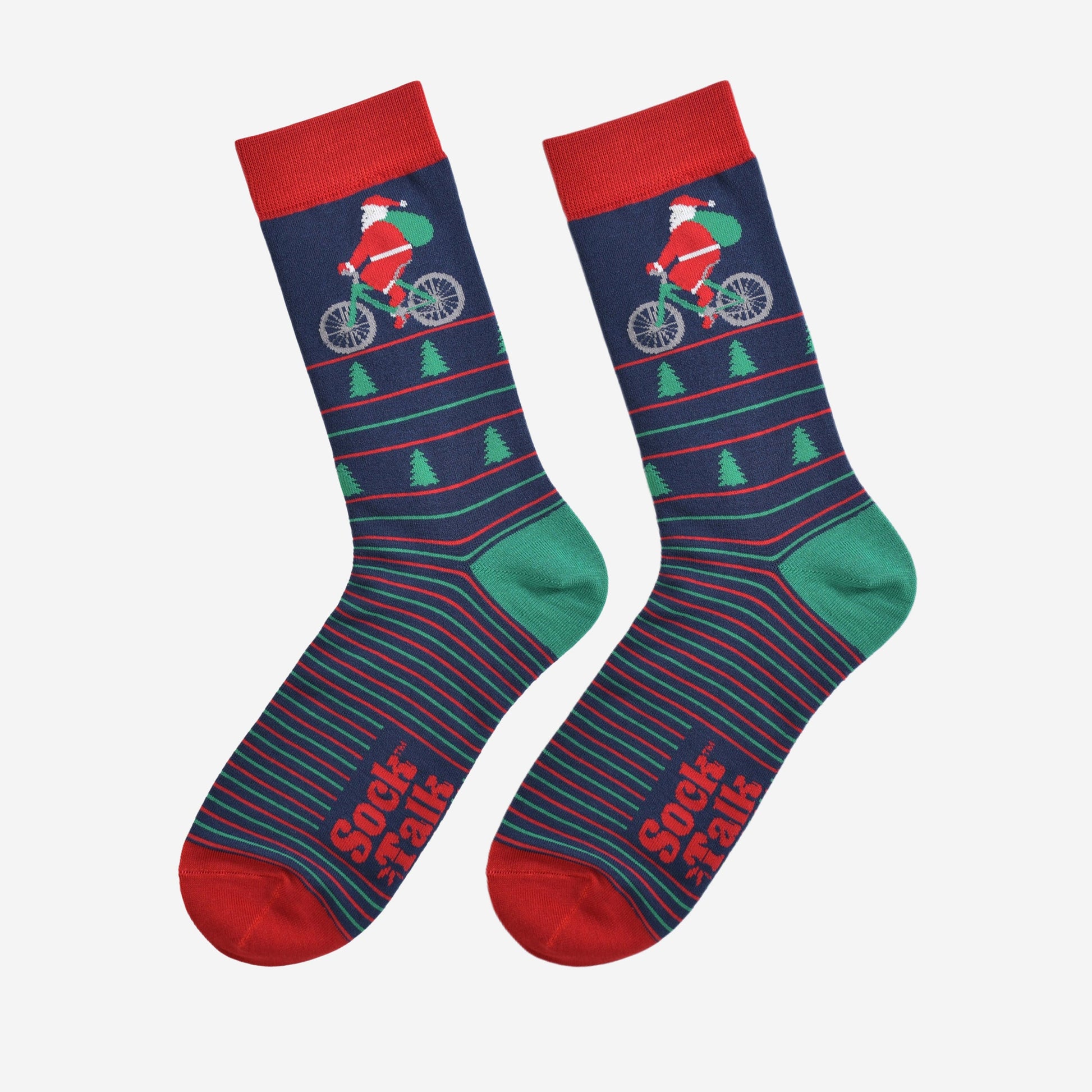 cycling santa socks laying flat, showing the green and red stripe pattern, xmas trees and santa on a bicycle
