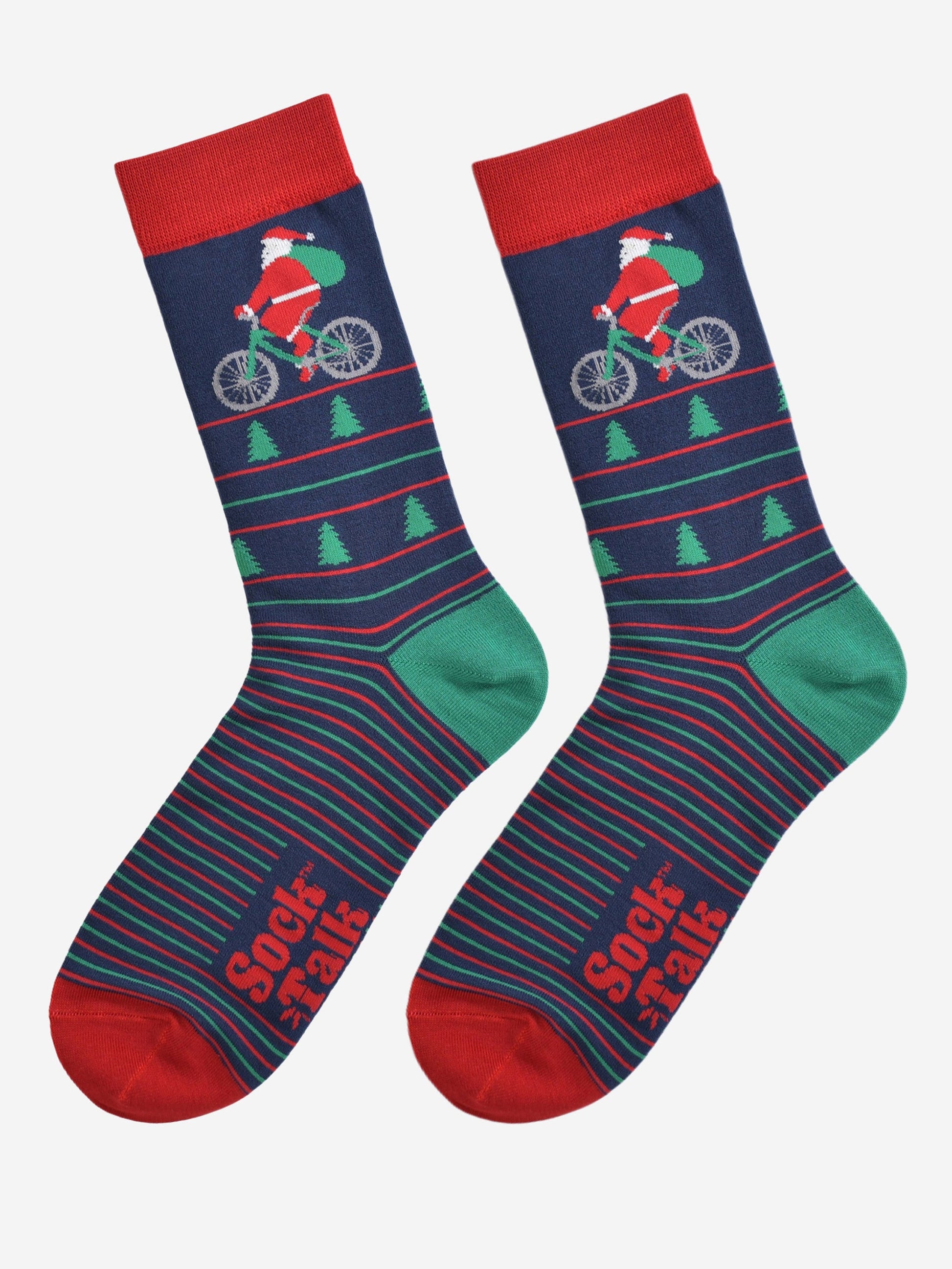 cycling santa socks laying flat, showing the green and red stripe pattern, xmas trees and santa on a bicycle