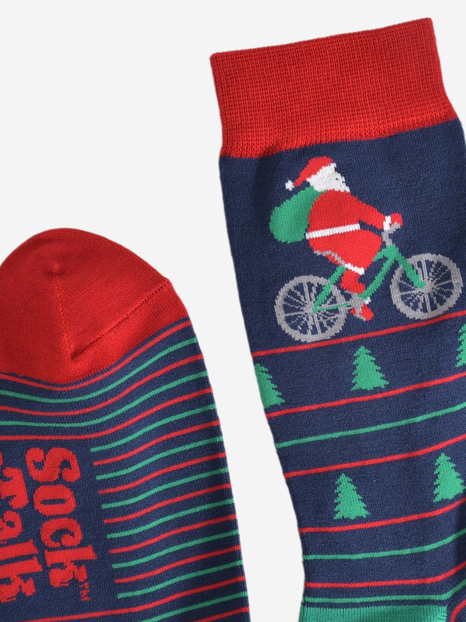 showing the cuff and toe of the socks, both are red and contrast the navy blue body of the socks