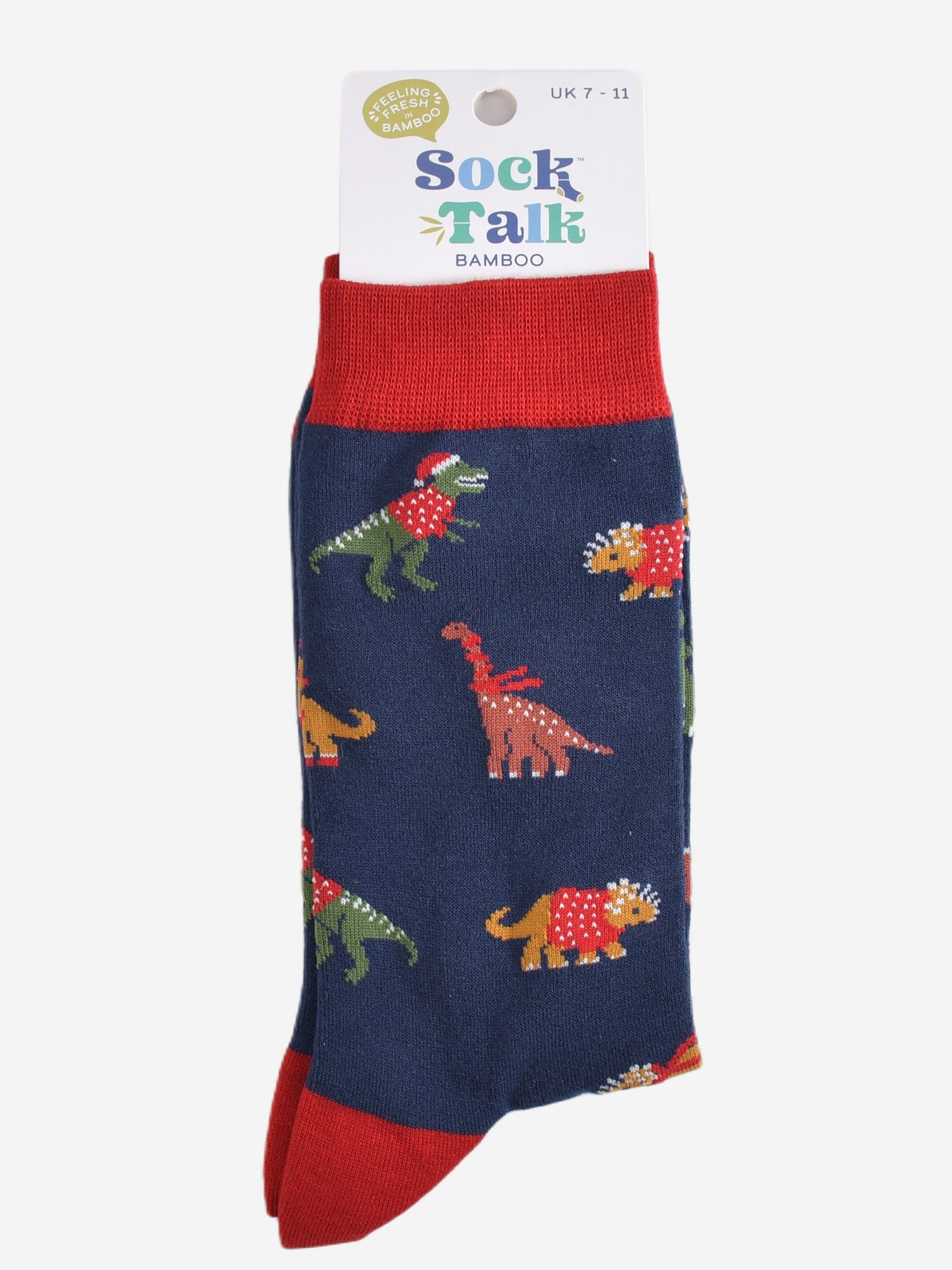 christmas dinosaur bamboo socks in their sock talk packaging, the socks are a uk size 7-11
