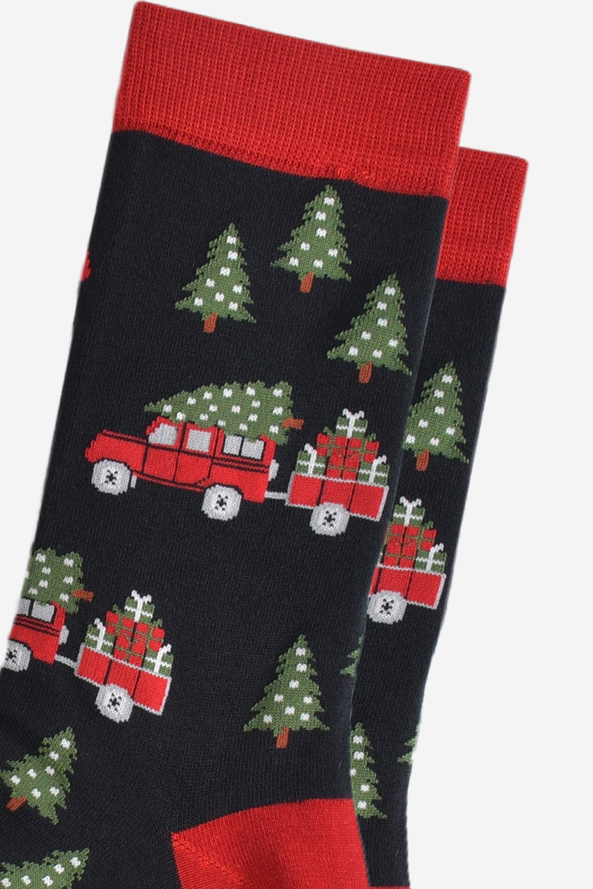 close up of the red off road vehicle, trailer, xmas tree and christmas gift design on the bamboo socks