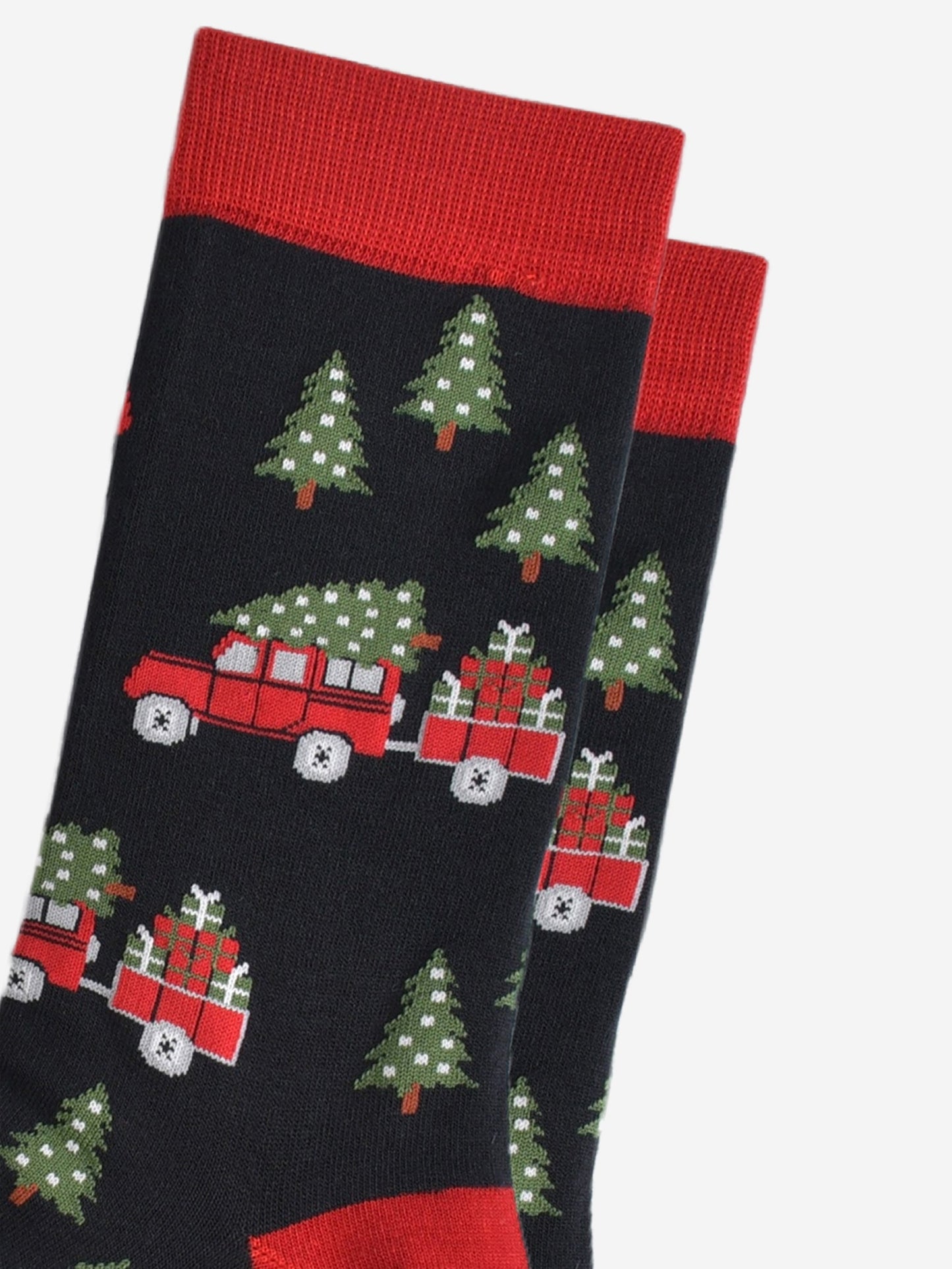 close up of the red off road vehicle, trailer, xmas tree and christmas gift design on the bamboo socks