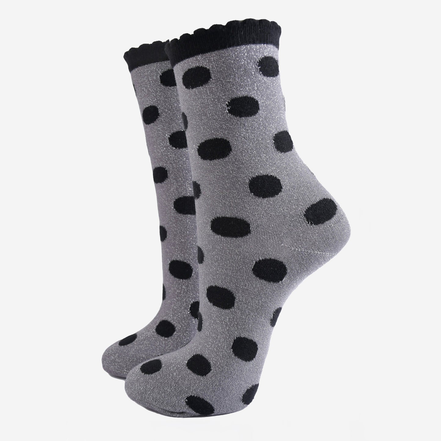 grey ankle socks with an all over black polka dot pattern