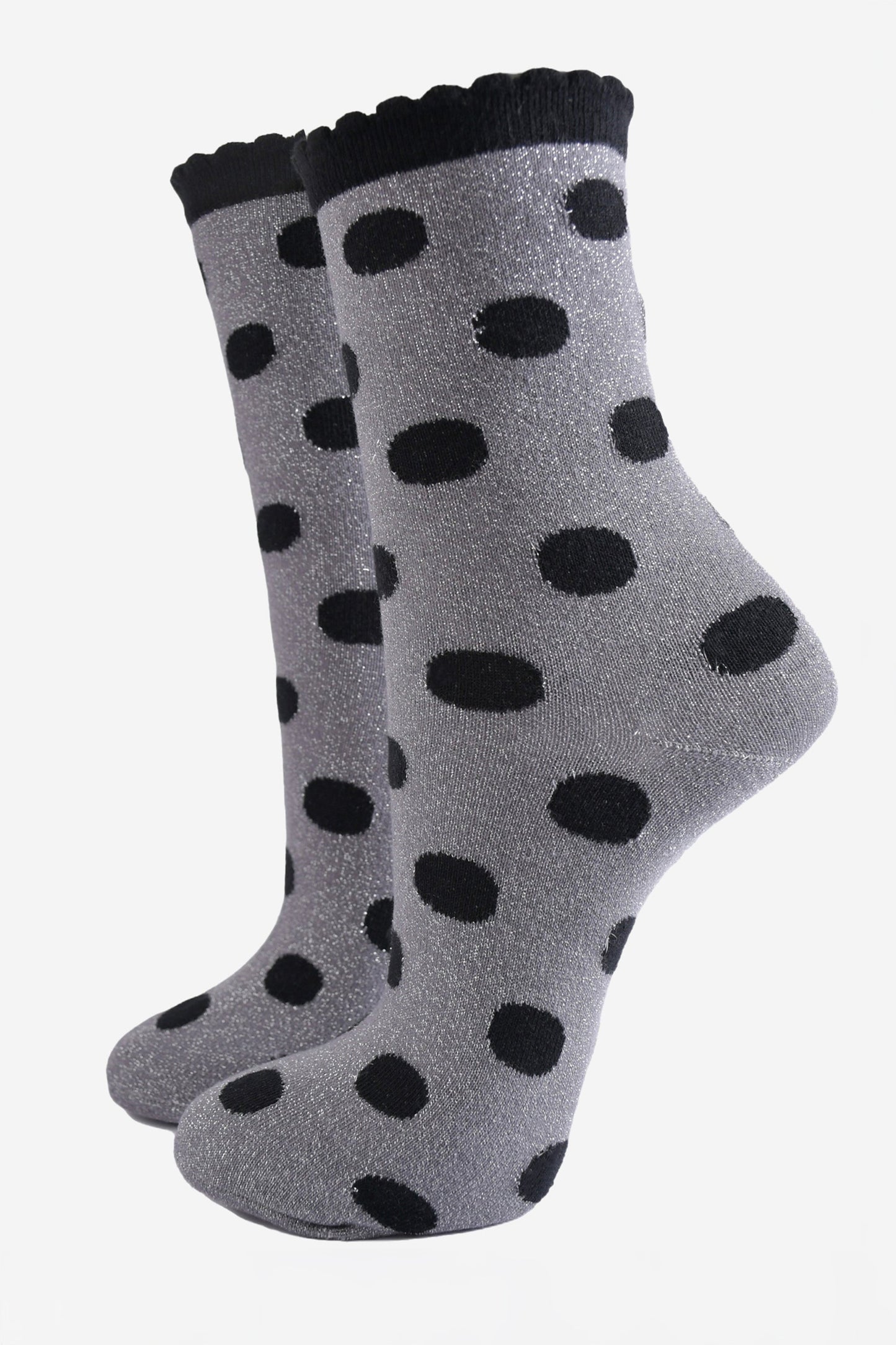 grey ankle socks with an all over black polka dot pattern