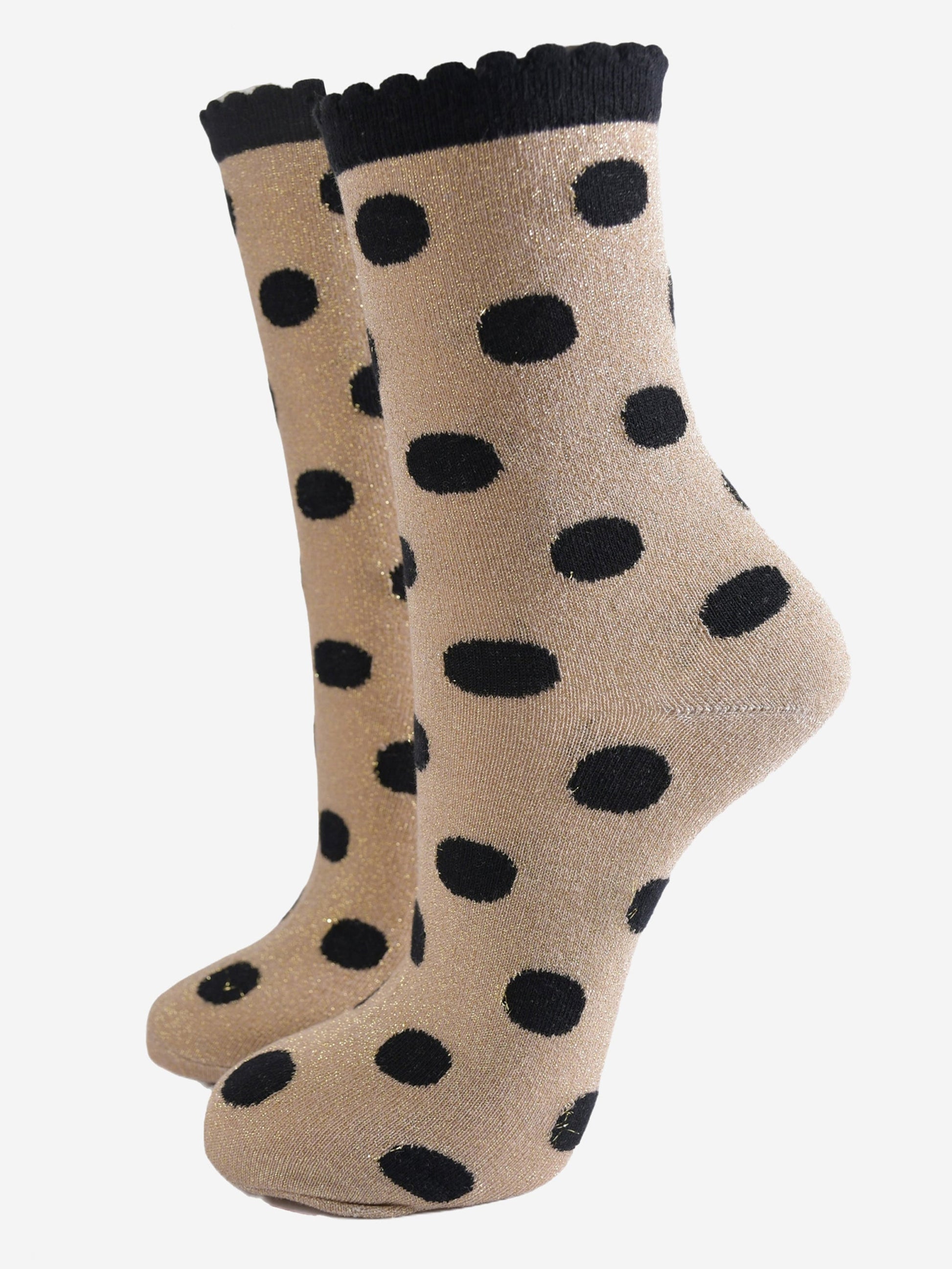 gold ankle socks with an all over black polka dot pattern