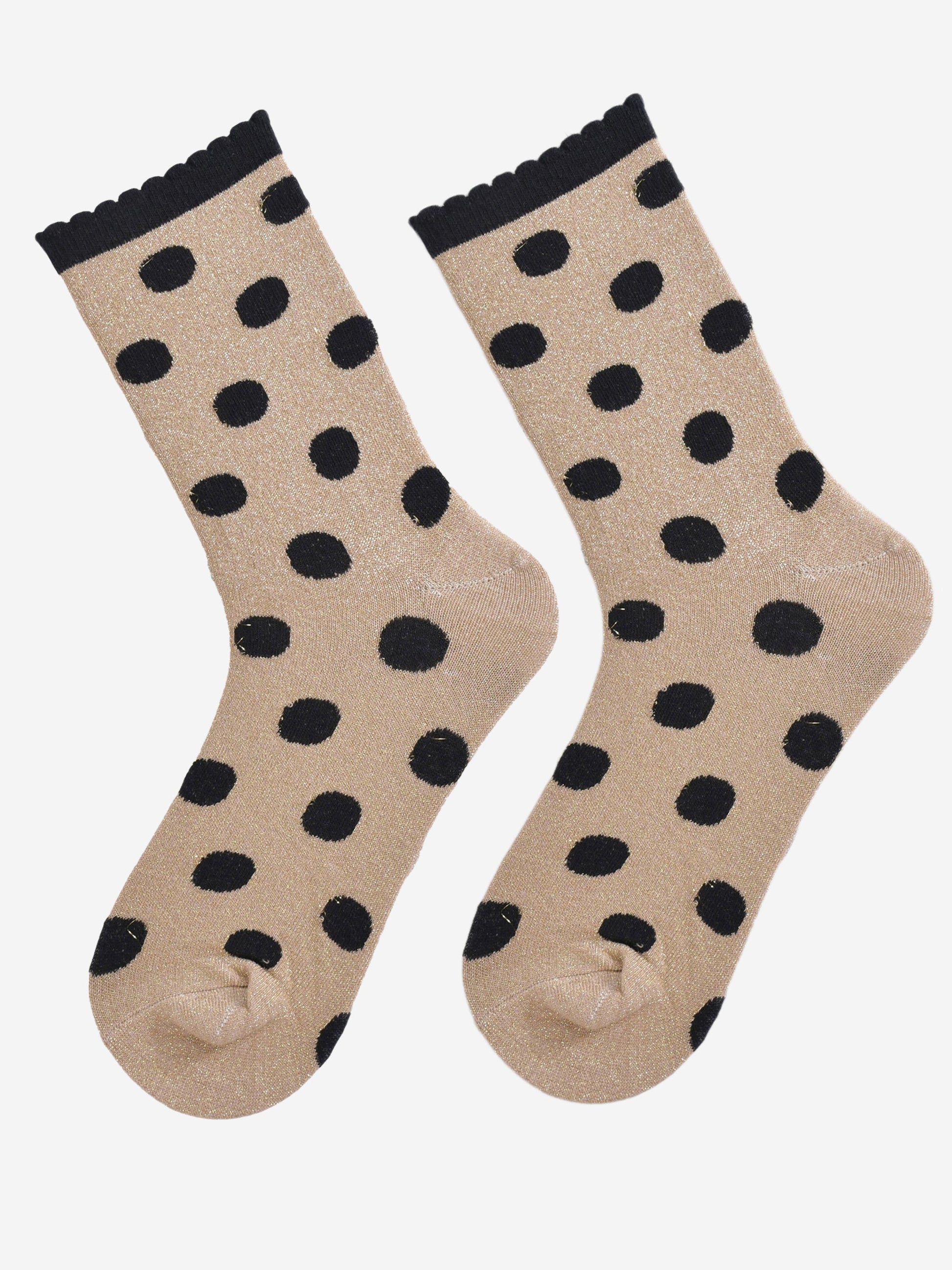 showing the gold and black polka dot socks laying flat, the silver glitter sparkle is visible and the black polka dot pattern is all over the design