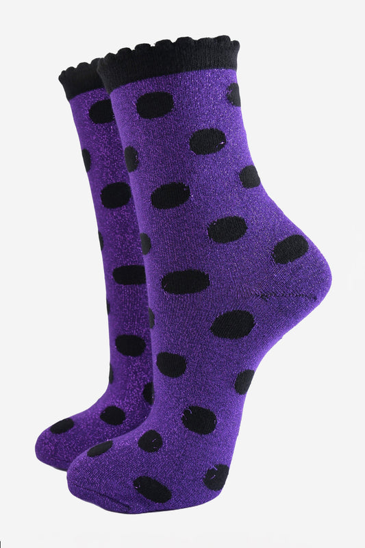 purple ankle socks with an all over black polka dot pattern