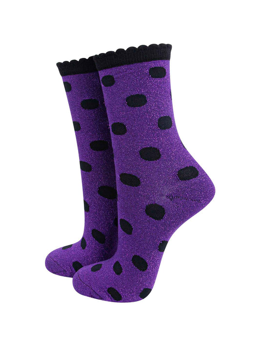purple ankle socks with an all over black polka dot pattern
