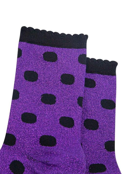 purple ankle socks with an all over black polka dot pattern