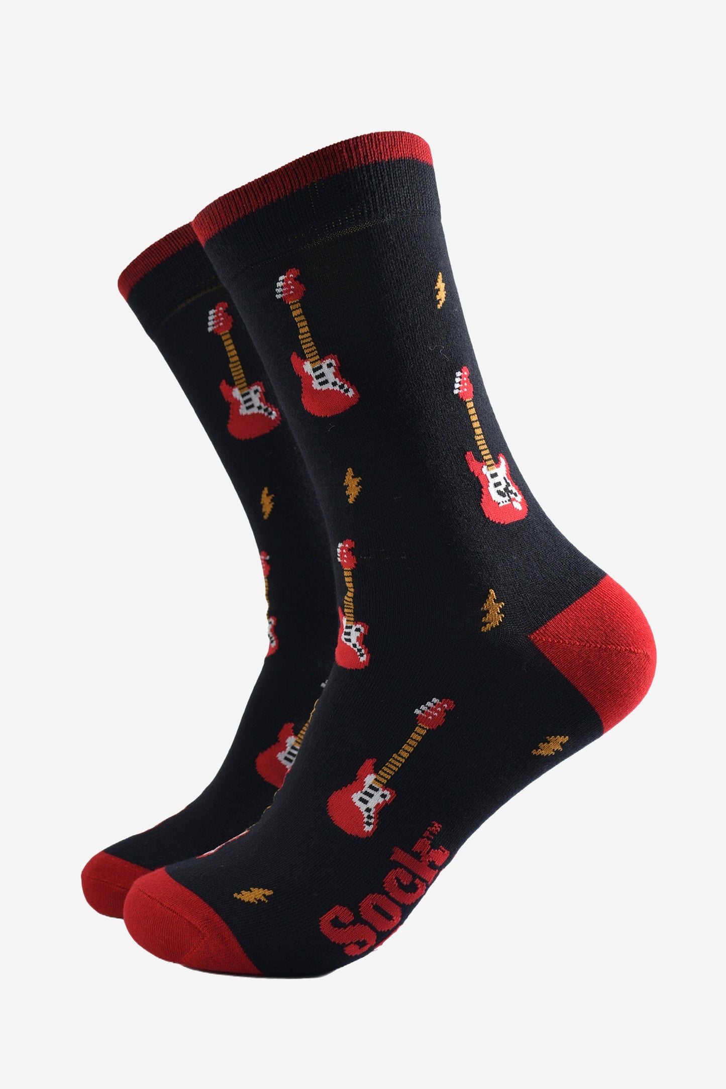 black socks with red heel, toe and cuff with an all over pattern of red electric guitars and yellow lightning bolts