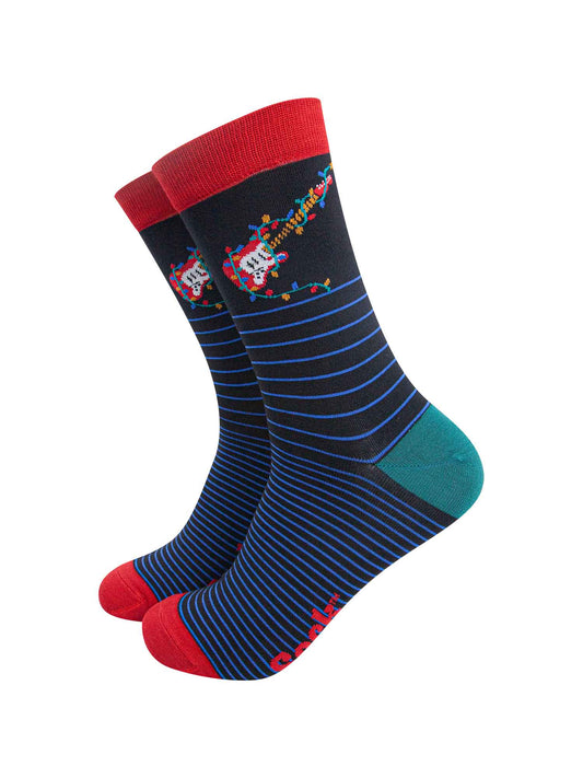 black socks with a blue horizontal pinstripe featuring a red eclectic guitar and festive xmas lights on the ankle