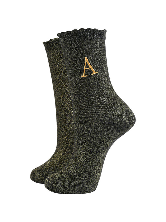 black ankle socks with a scalloped cuff, with an all over gold glitter sparkle and an embroidered gold letter a on the ankle
