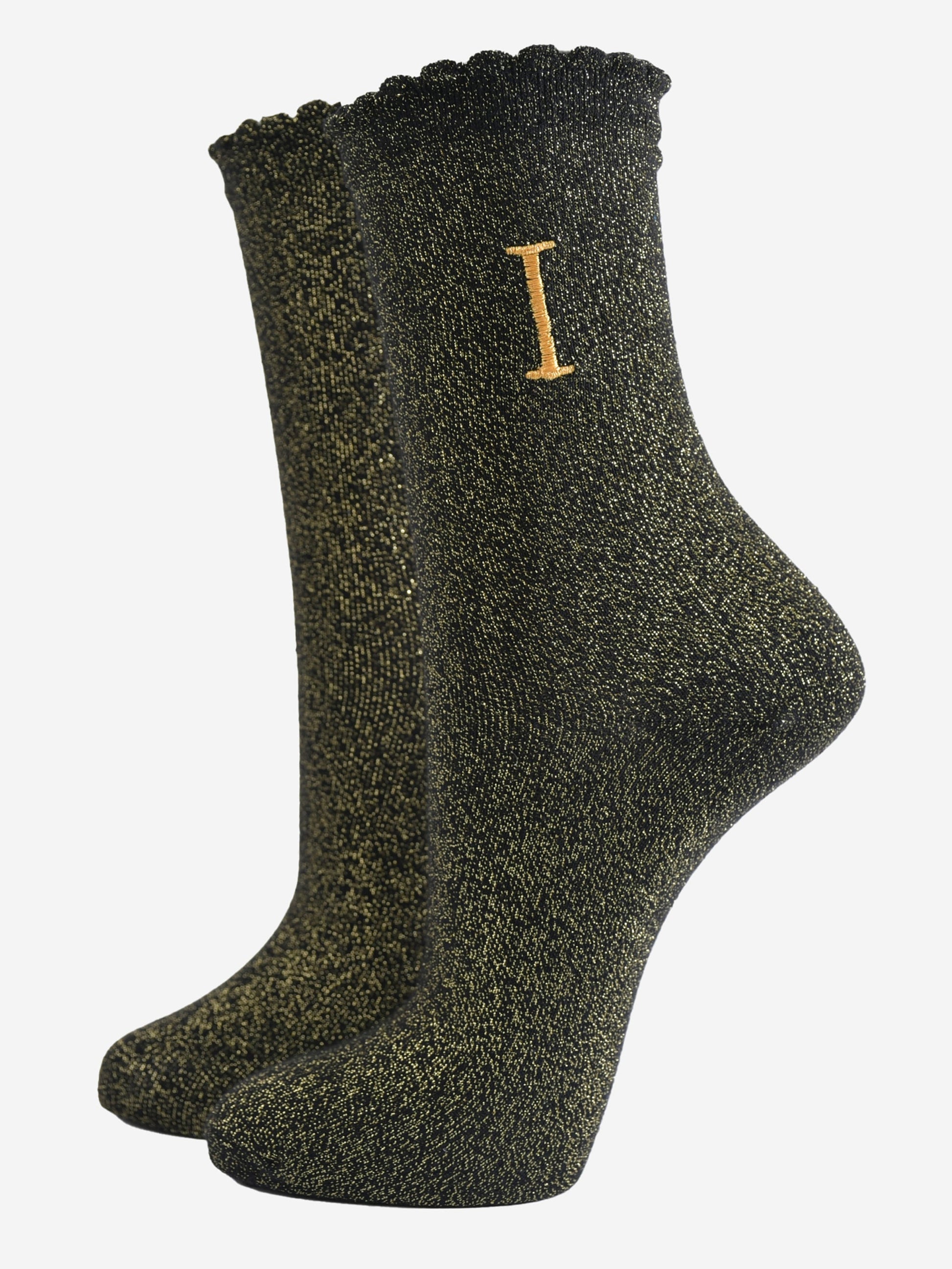 black ankle socks with a scalloped cuff, with an all over gold glitter sparkle and an embroidered gold letter i on the ankle