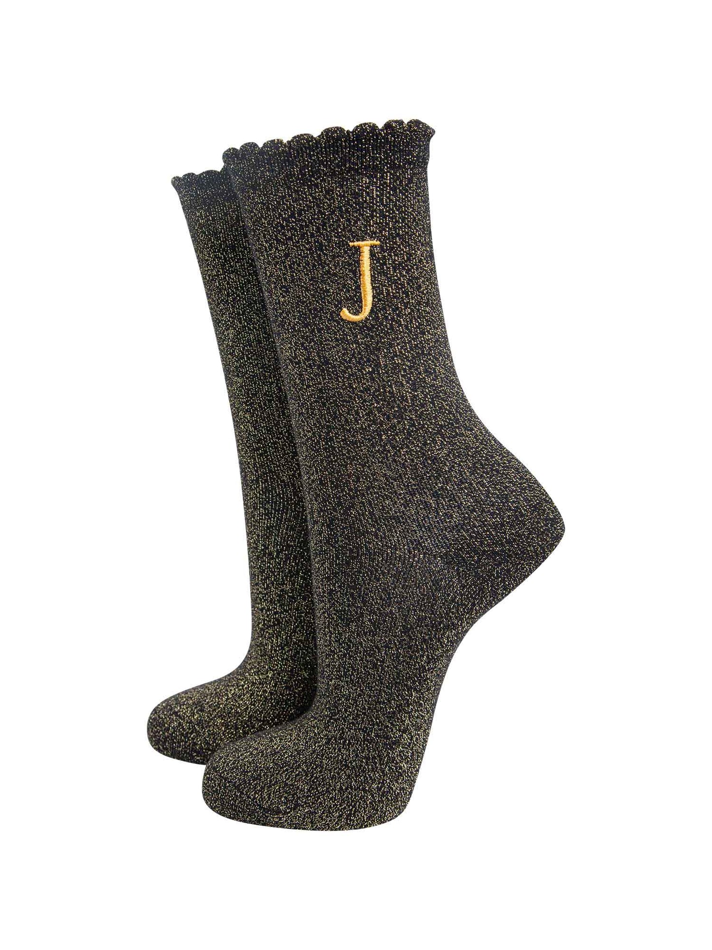 black ankle socks with a scalloped cuff, with an all over gold glitter sparkle and an embroidered gold letter j on the ankle
