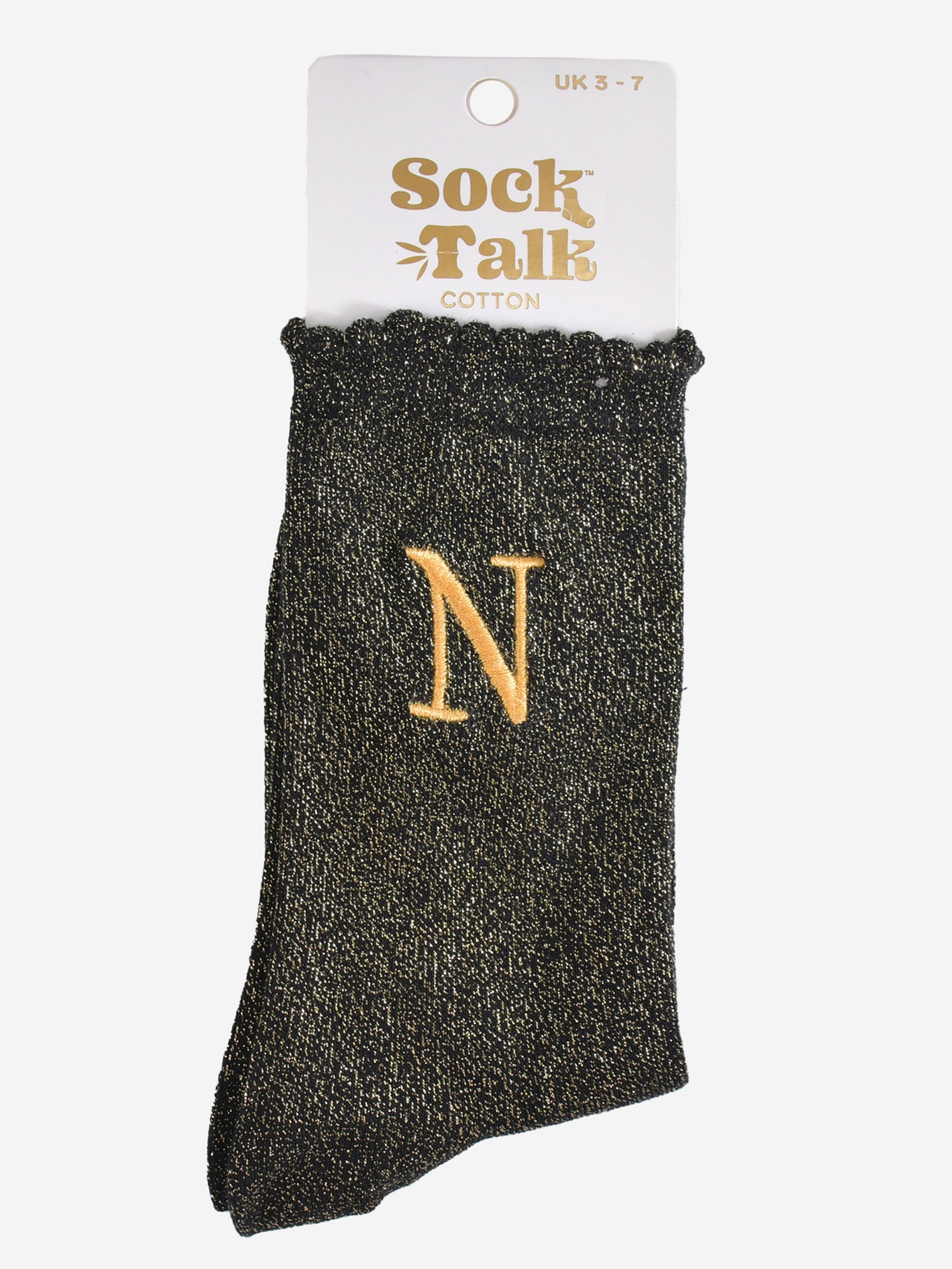 embroidered glitter letter n cotton ankle socks in their sock talk packaging, the socks are a uk size 3-7