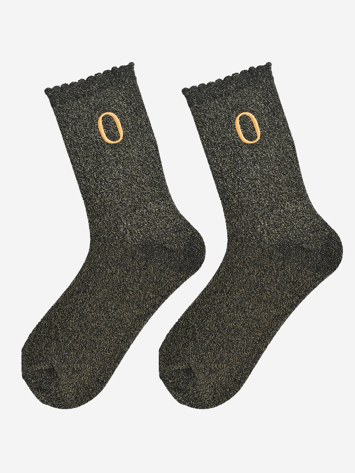 showing the glitter socks laying flat, they have a scalloped cuff and an all over gold sparkle