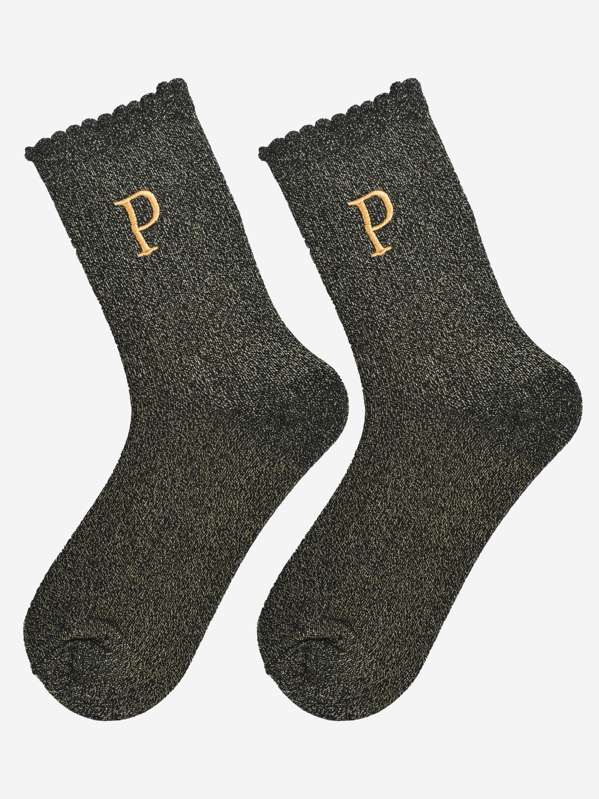 showing the glitter socks laying flat, they have a scalloped cuff and an all over gold sparkle